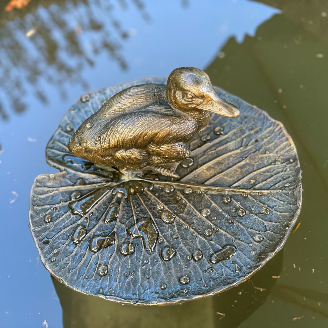 Bronze Duck on Lily Pad